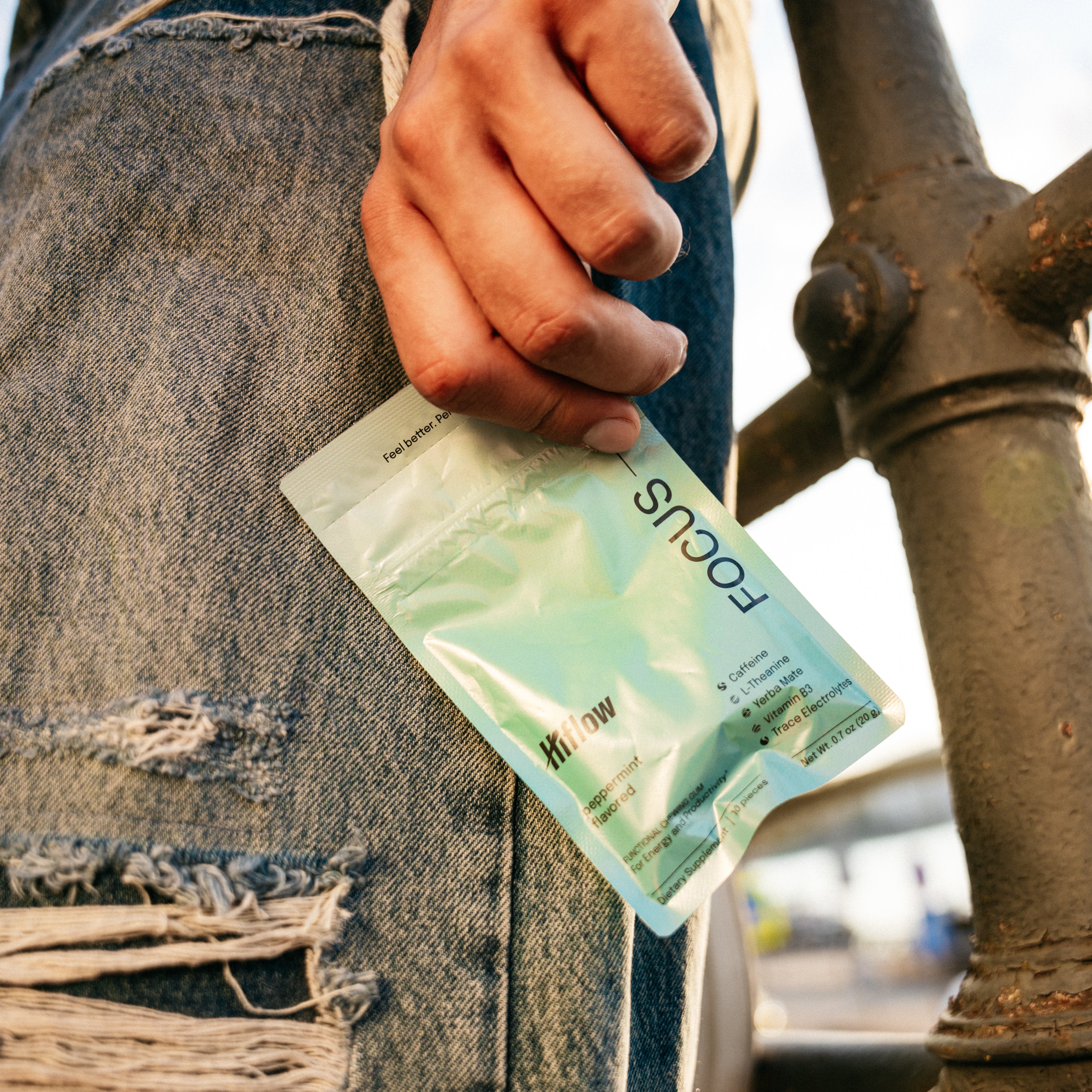 A blue Hiflow Focus package in someone's hand.