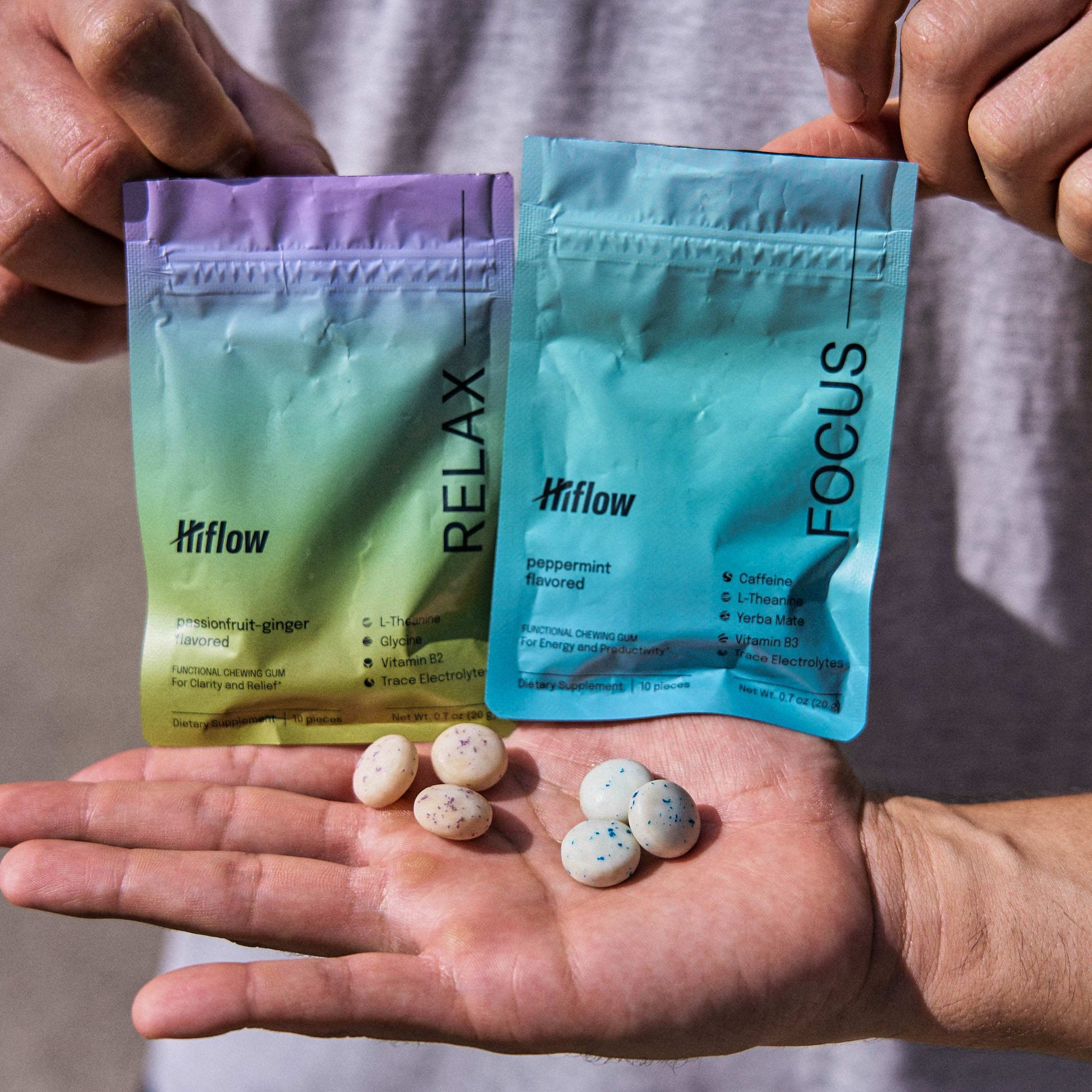 Two Hiflow pouches labeled 'Relax' and 'Focus' with some gum pieces also shown in front of them.